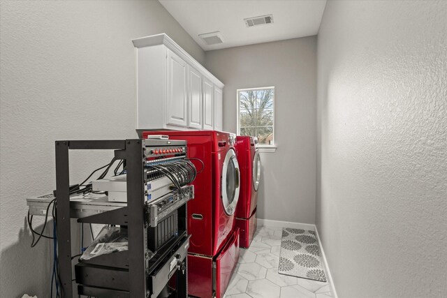 5610 Kensington Ct, Parker, TX 75002 - laundry area featuring independent washer and dryer, cabinet space, and baseboards