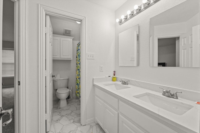 5610 Kensington Ct, Parker, TX 75002 - full bathroom with toilet, double vanity, and marble look tiles