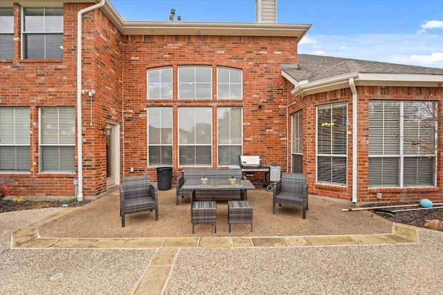 5610 Kensington Ct, Parker, TX 75002 - rear view of property featuring a patio area, brick siding, and a chimney