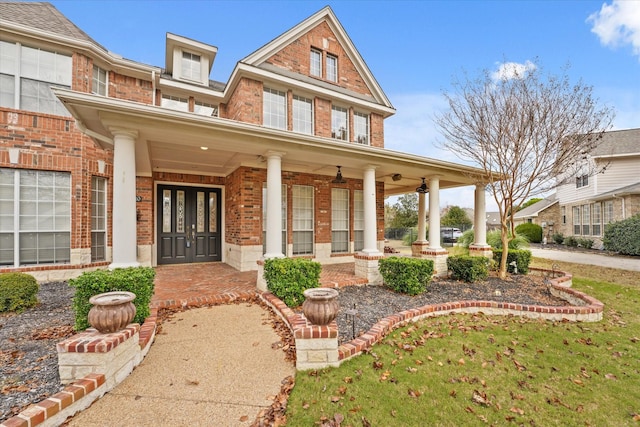 5610 Kensington Ct, Parker, TX 75002 - view of front of house with brick siding, french doors, and covered porch