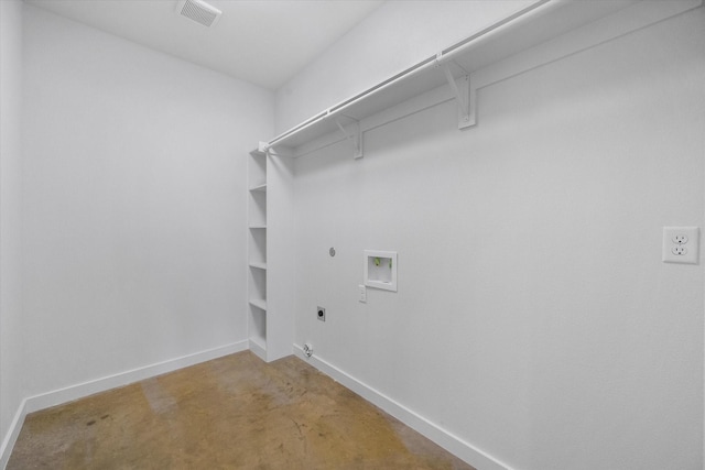 washroom featuring gas dryer hookup, hookup for an electric dryer, hookup for a washing machine, and baseboards