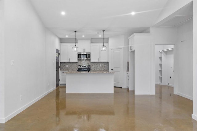 kitchen featuring appliances with stainless steel finishes, concrete flooring, decorative backsplash, recessed lighting, and white cabinets
