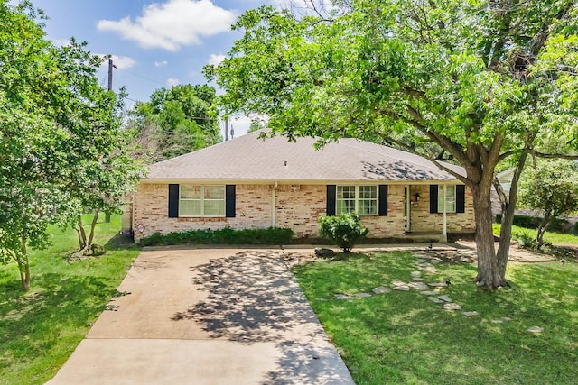 3048 Golfing Green Dr, Farmers Branch, TX 75234 - ranch-style house with a front lawn, brick siding, and a shingled roof