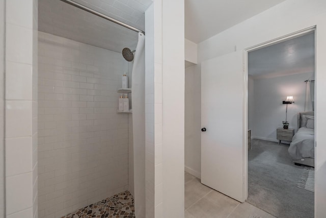 3048 Golfing Green Dr, Farmers Branch, TX 75234 - ensuite bathroom featuring a tile shower and tile patterned flooring