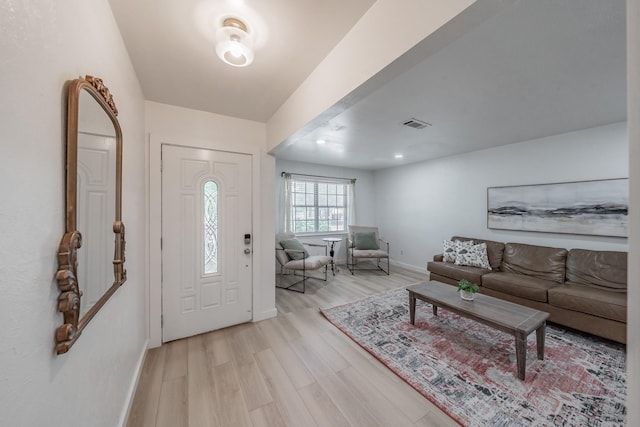 3048 Golfing Green Dr, Farmers Branch, TX 75234 - foyer entrance with baseboards and light wood-style floors