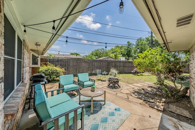 3048 Golfing Green Dr, Farmers Branch, TX 75234 - view of patio / terrace with a fire pit and a fenced backyard