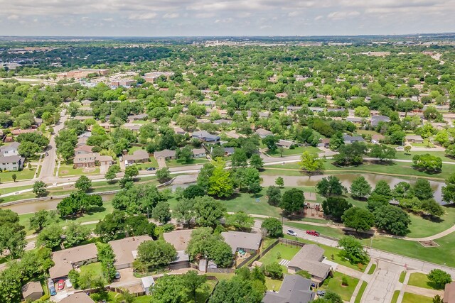 3048 Golfing Green Dr, Farmers Branch, TX 75234 - aerial perspective of suburban area featuring a nearby body of water