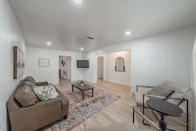 3048 Golfing Green Dr, Farmers Branch, TX 75234 - living room featuring light wood finished floors, recessed lighting, and baseboards