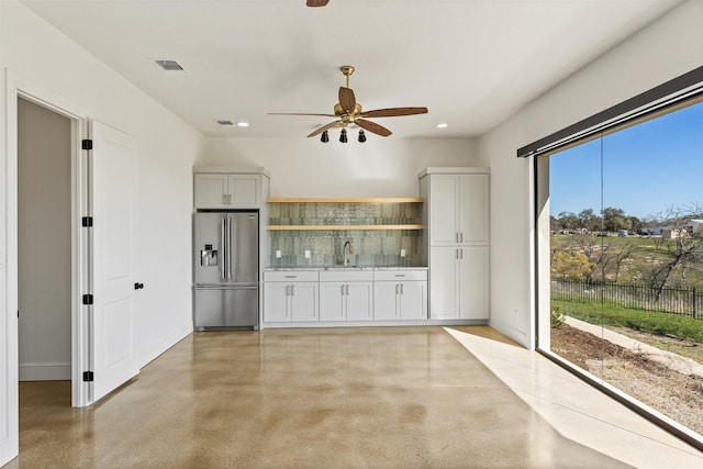 10072 Blanco Springs Rd, Temple, TX 76528 - unfurnished living room featuring a ceiling fan, a sink, recessed lighting, concrete flooring, and baseboards