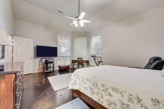 bedroom featuring concrete floors and baseboards