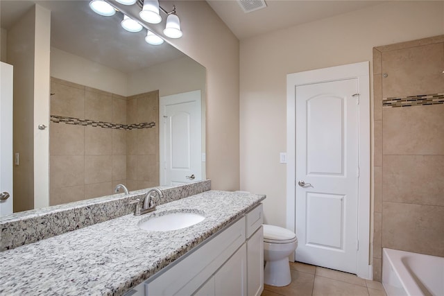 full bathroom with tile patterned flooring, toilet, a tub, vanity, and a shower