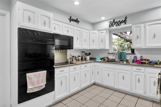 3205 Glasgow Ter, Arlington, TX 76015 - kitchen featuring black appliances, decorative backsplash, white cabinets, a sink, and light tile patterned floors
