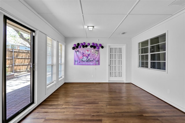 3205 Glasgow Ter, Arlington, TX 76015 - unfurnished dining area featuring wood finished floors and baseboards