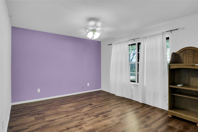 3205 Glasgow Ter, Arlington, TX 76015 - empty room featuring wood finished floors and baseboards