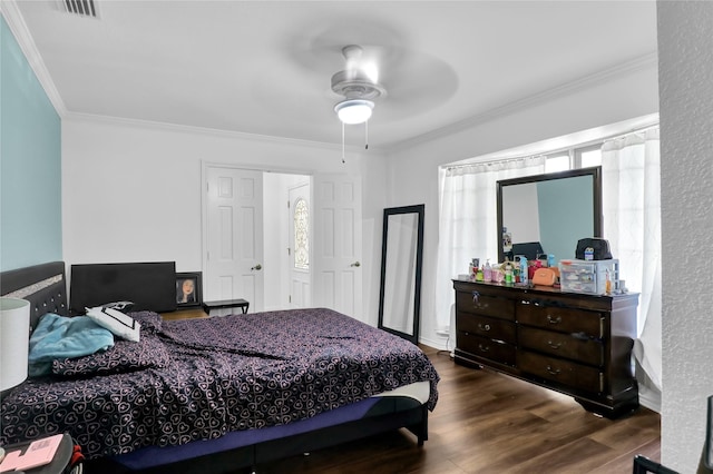 3205 Glasgow Ter, Arlington, TX 76015 - bedroom with crown molding, wood finished floors, and ceiling fan