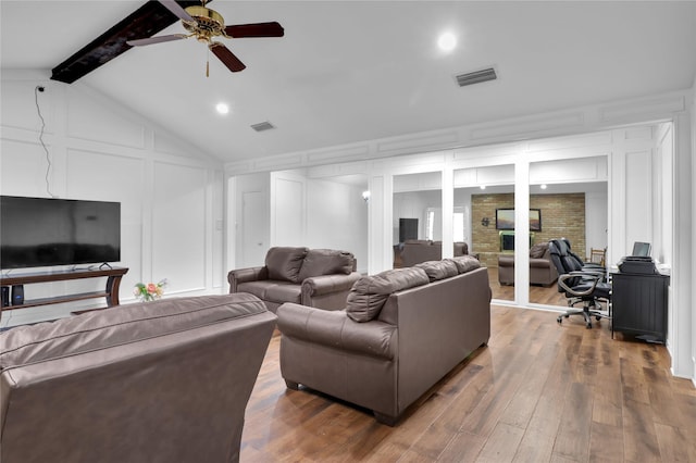 3205 Glasgow Ter, Arlington, TX 76015 - living room featuring a decorative wall, a ceiling fan, wood finished floors, and a desk