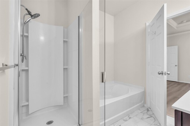 1321 Rivers Creek Ln, Little Elm, TX 75068 - bathroom with ornamental molding, a stall shower, a bath, baseboards, and vanity