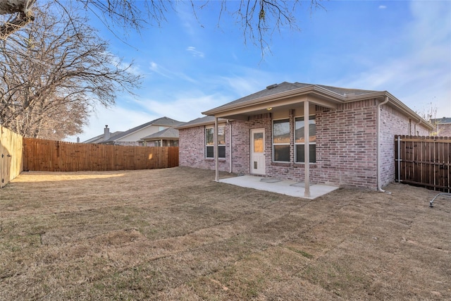 1321 Rivers Creek Ln, Little Elm, TX 75068 - back of property with brick siding and a patio