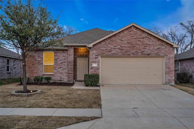 1321 Rivers Creek Ln, Little Elm, TX 75068 - single story home featuring brick siding, an attached garage, driveway, and roof with shingles
