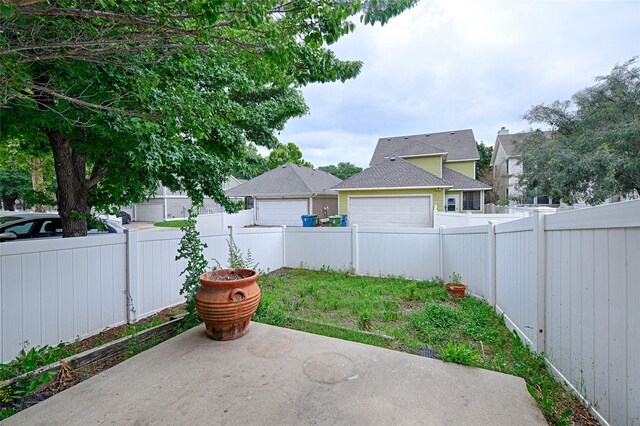 9912 Concord Dr, Providence Village, TX 76227 - fenced backyard featuring a patio