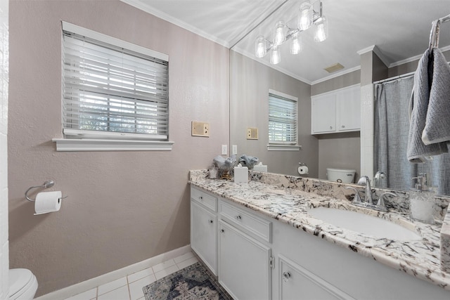 full bathroom with toilet, ornamental molding, baseboards, tile patterned flooring, and vanity