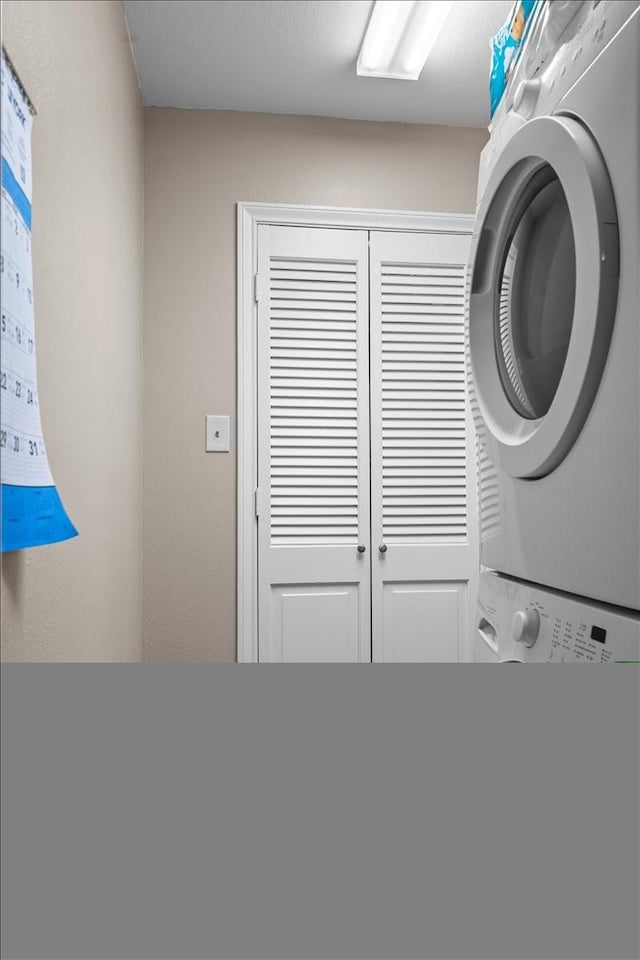 5036 Lake Shore Dr, Waco, TX 76710 - laundry area with stacked washer / drying machine