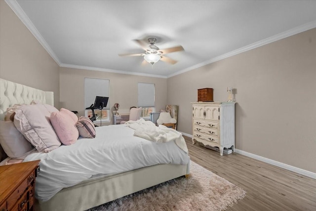 5036 Lake Shore Dr, Waco, TX 76710 - bedroom featuring baseboards, wood finished floors, ornamental molding, and ceiling fan