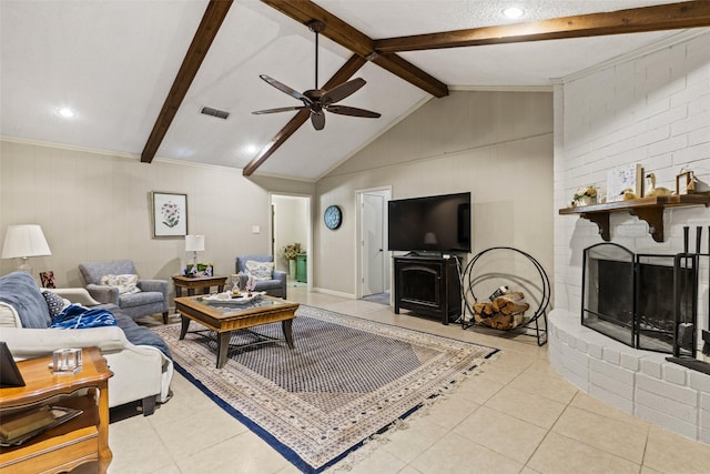 tiled living room with a fireplace, a ceiling fan, and wooden walls