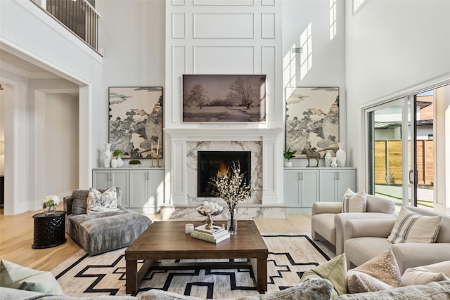 2009 Wheeler Dr, Southlake, TX 76092 - living room with a high ceiling, wood finished floors, and a premium fireplace