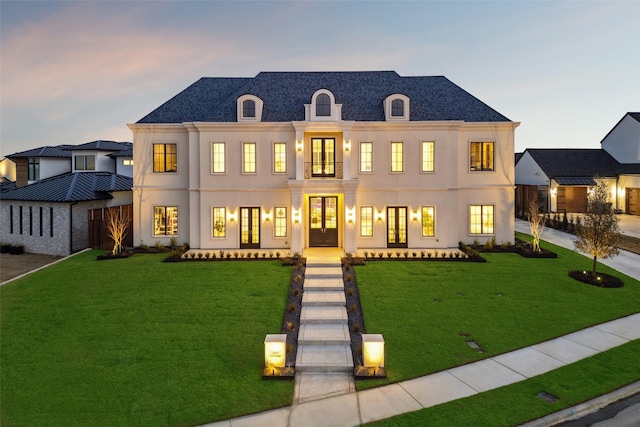 2009 Wheeler Dr, Southlake, TX 76092 - french country inspired facade with french doors, a front lawn, a shingled roof, and stucco siding