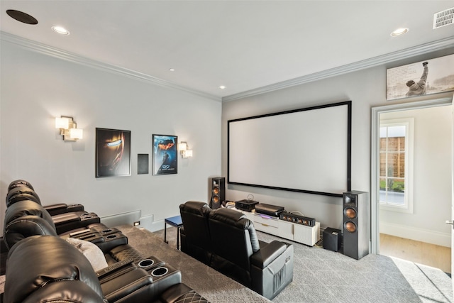 cinema with crown molding, recessed lighting, baseboards, and wood finished floors