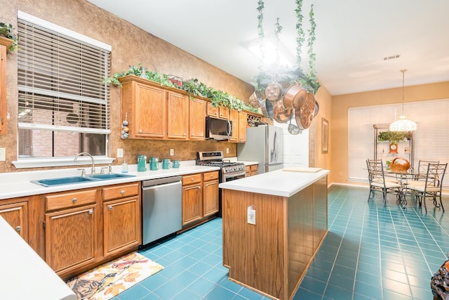 5509 Allen Ln, Rowlett, TX 75088 - kitchen featuring stainless steel appliances, a sink, dark tile patterned floors, and tasteful backsplash