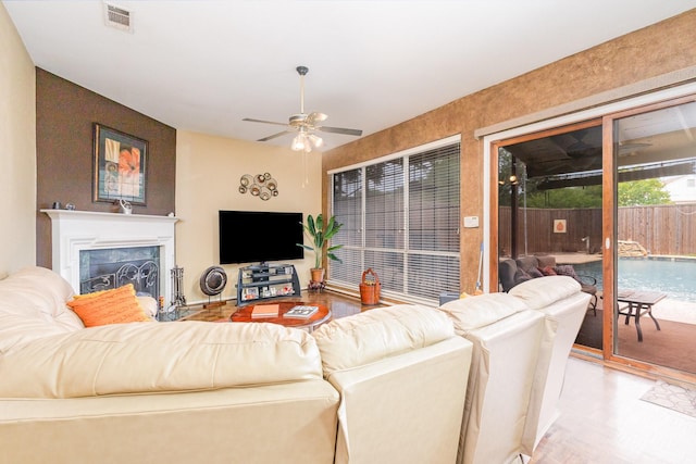 5509 Allen Ln, Rowlett, TX 75088 - living area with ceiling fan and a fireplace