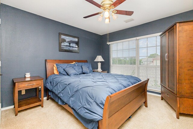 5509 Allen Ln, Rowlett, TX 75088 - bedroom featuring light colored carpet, baseboards, and ceiling fan