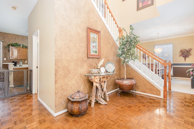 5509 Allen Ln, Rowlett, TX 75088 - staircase with baseboards, a chandelier, and a towering ceiling
