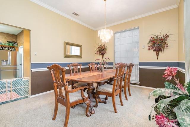 5509 Allen Ln, Rowlett, TX 75088 - carpeted dining space featuring a chandelier, crown molding, and baseboards