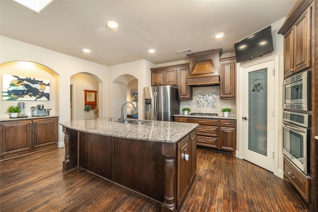 1519 Eminence Ln, Saint Paul, TX 75098 - kitchen featuring stainless steel appliances, a sink, custom range hood, dark wood-style floors, and recessed lighting