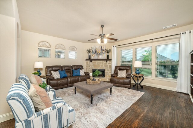 1519 Eminence Ln, Saint Paul, TX 75098 - living area with baseboards, dark wood-style floors, ceiling fan, and a fireplace