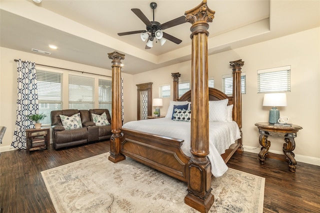 1519 Eminence Ln, Saint Paul, TX 75098 - bedroom with baseboards, decorative columns, wood finished floors, a raised ceiling, and ceiling fan