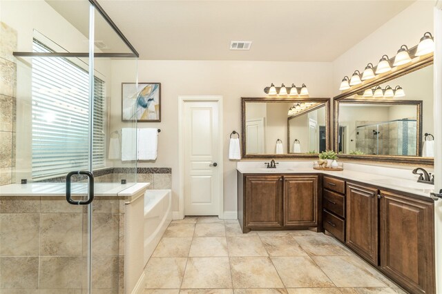 1519 Eminence Ln, Saint Paul, TX 75098 - bathroom with a garden tub, a shower stall, double vanity, and tile patterned floors