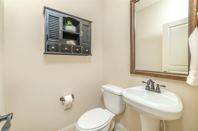 1519 Eminence Ln, Saint Paul, TX 75098 - half bath with baseboards, toilet, and a sink
