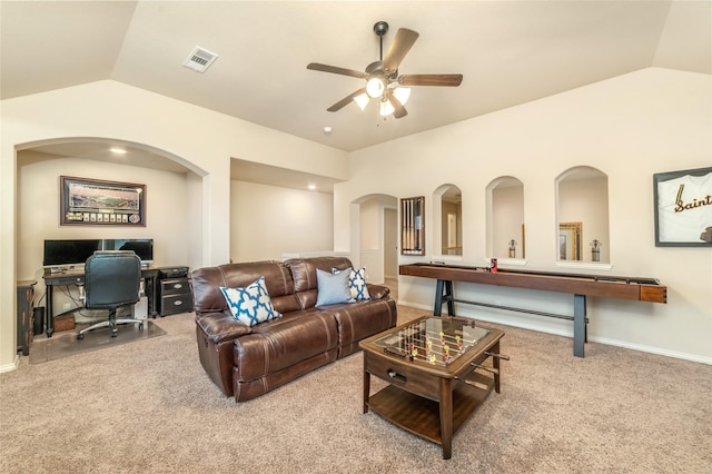 1519 Eminence Ln, Saint Paul, TX 75098 - carpeted living room featuring vaulted ceiling, a desk, a ceiling fan, arched walkways, and baseboards