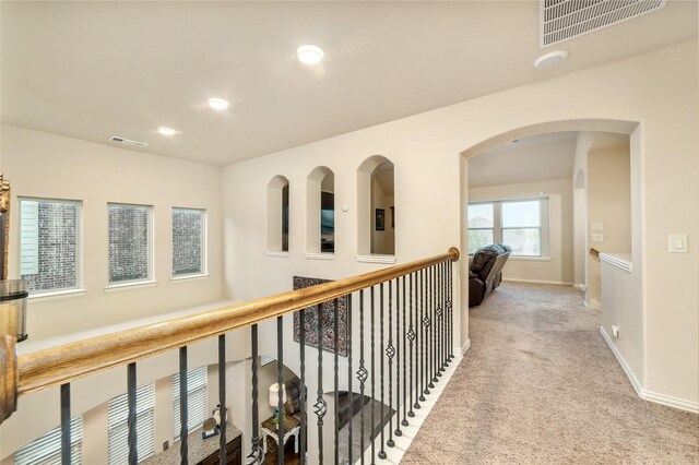 1519 Eminence Ln, Saint Paul, TX 75098 - hallway featuring carpet flooring, baseboards, recessed lighting, and arched walkways