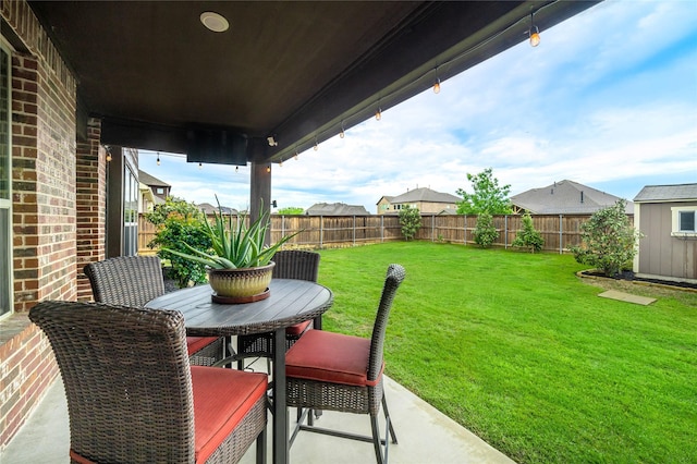 1519 Eminence Ln, Saint Paul, TX 75098 - view of patio / terrace featuring outdoor dining area and a storage unit
