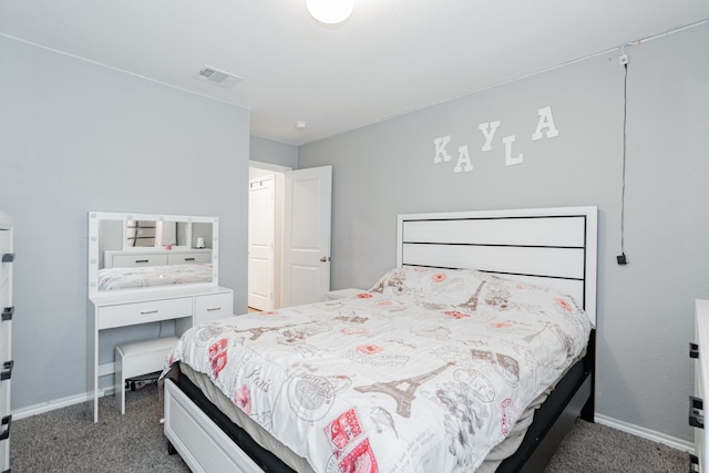 bedroom with carpet flooring and baseboards