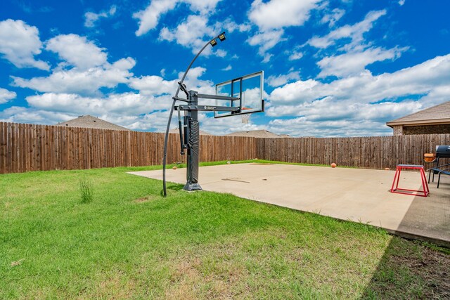 view of basketball court with basketball hoop