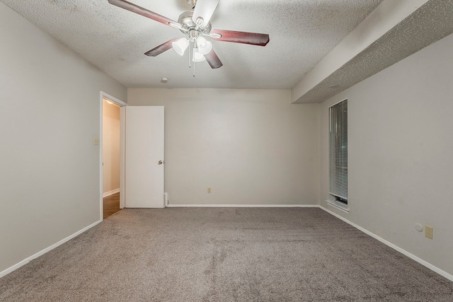 1600 Lagoona Ln, Edgecliff Village, TX 76134 - carpeted spare room with a textured ceiling, ceiling fan, and baseboards