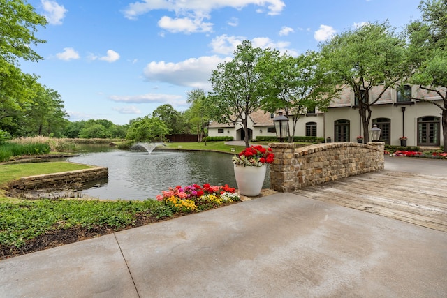 view of property's community featuring a water view