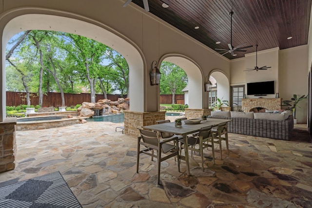 1100 La Paloma Ct, Southlake, TX 76092 - fenced backyard with an in-ground hot tub, an outdoor living space, ceiling fan, exterior kitchen, and a patio