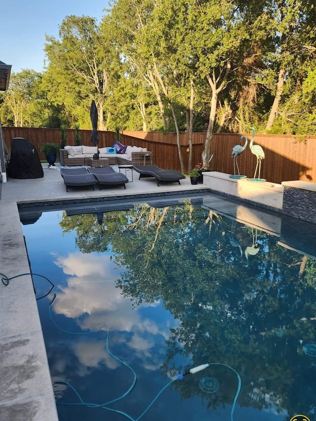 1803 Eastwood Ct, Mansfield, TX 76063 - view of swimming pool with an outdoor living space, a fenced backyard, and a patio area